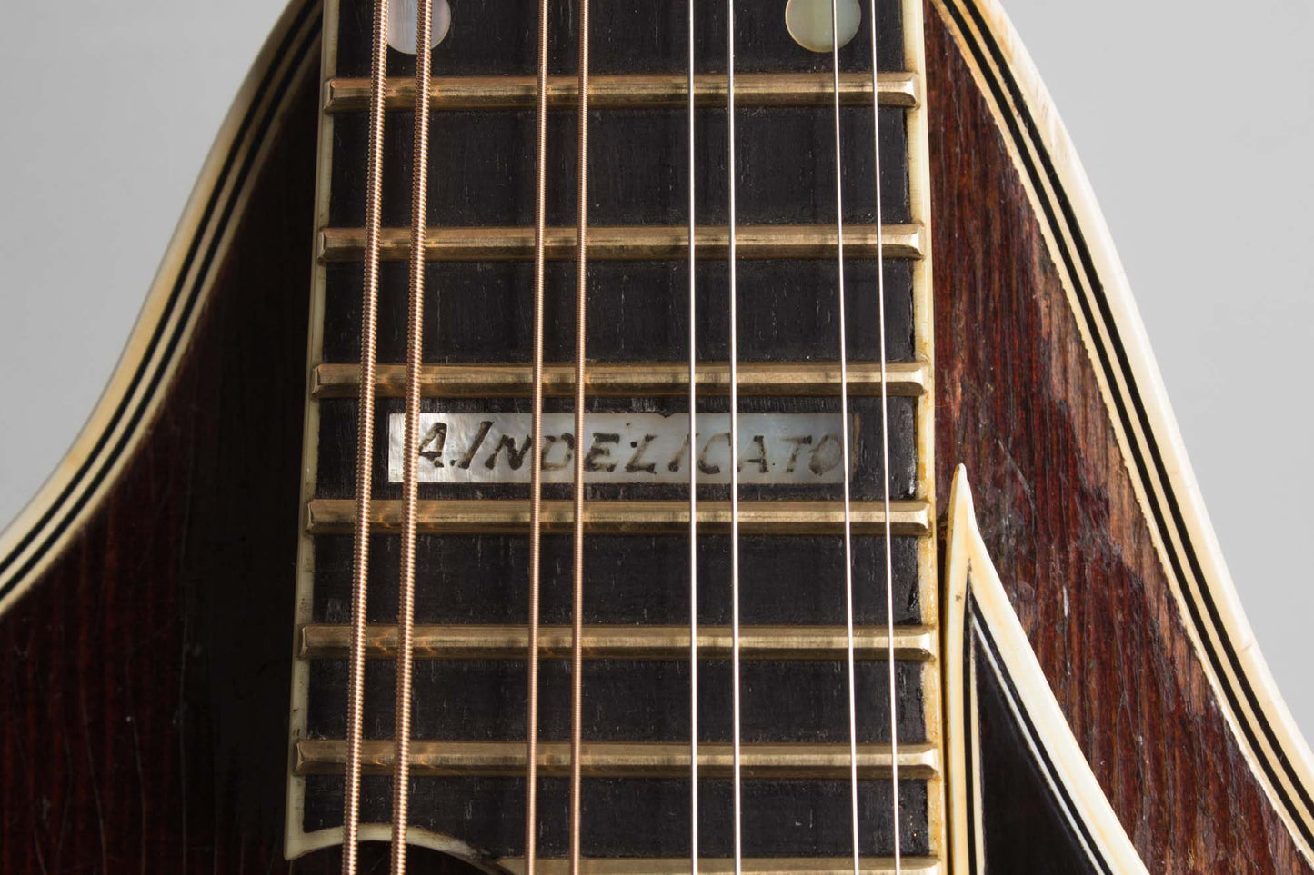 D'Angelico Scroll Headstock Carved Top Mandolin (1942)